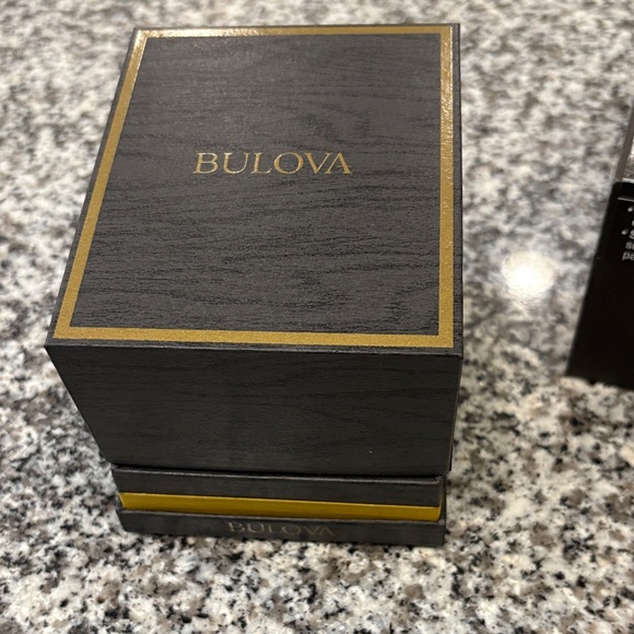 Bulova Black and Gold Skeleton Watch - Picture 7 of 7